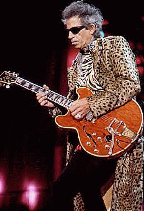 [Keith in Cheetah Coat]